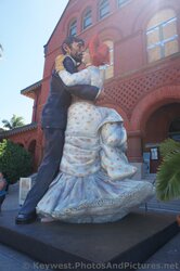 Statues of Man and Woman Dancing in front of Key West Customs House Museum.jpg