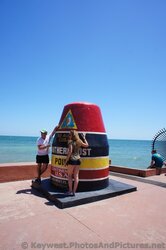 Tourists Take Photo with Southernmost Point Key West.jpg