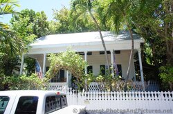 410 Margaret St Key West House with Second Story Windows Slightly Under Porch Cover.jpg