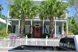Two Story Home with second story porch & red door in Key West.jpg