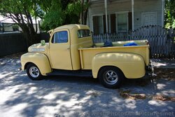 Yellow Vintage Truck parked on street in Key West.jpg