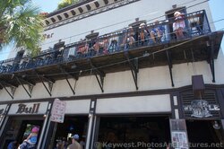 People on Second Story Balcony of Bull & The Whistle Bar Key West on Duval St.jpg